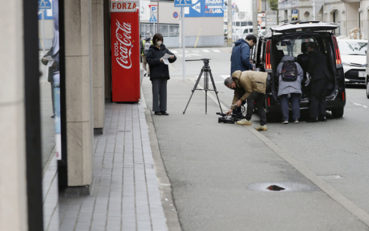 phóng viên tác nghiệp tại hiện trường